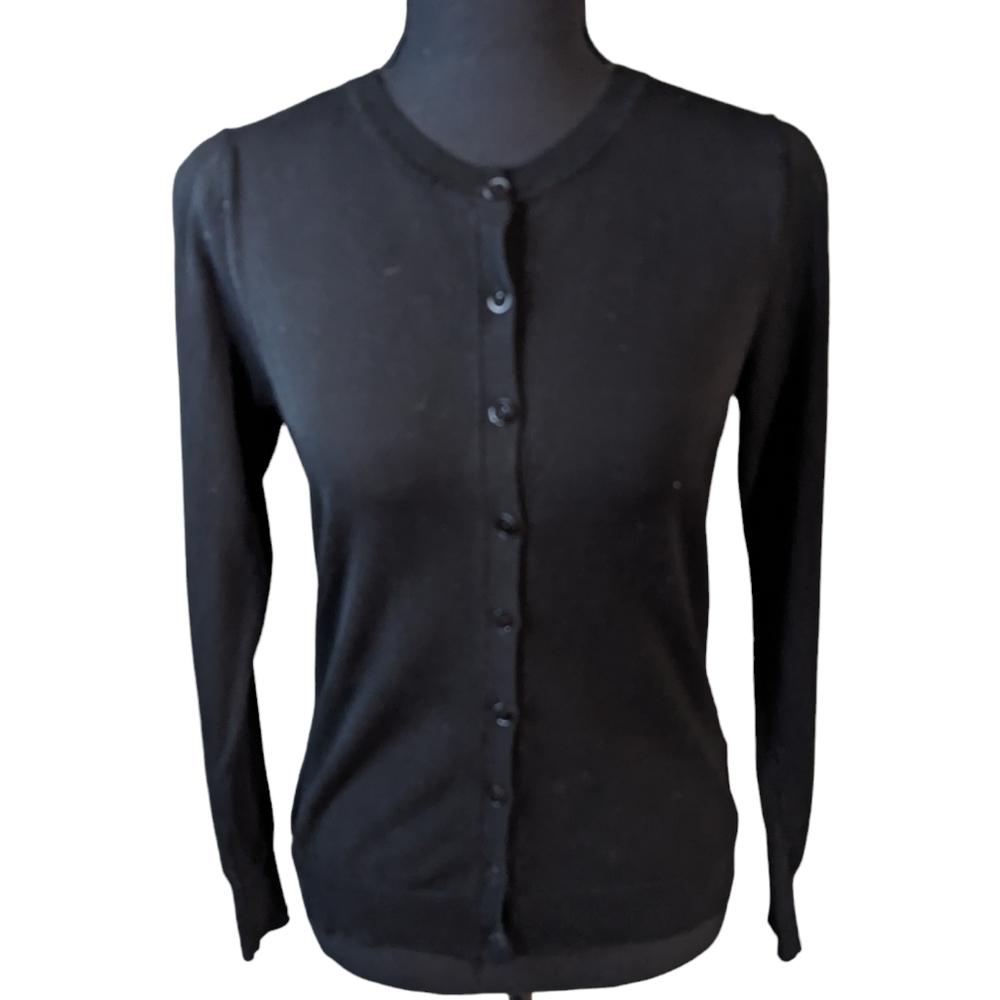 August Silk knit cardigan in black size small.  Small amount of wear top button